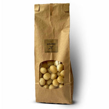 Raw whole macadamia nuts in sharing sized bag 250g. Macadamias from smallholder farmers in Malawi